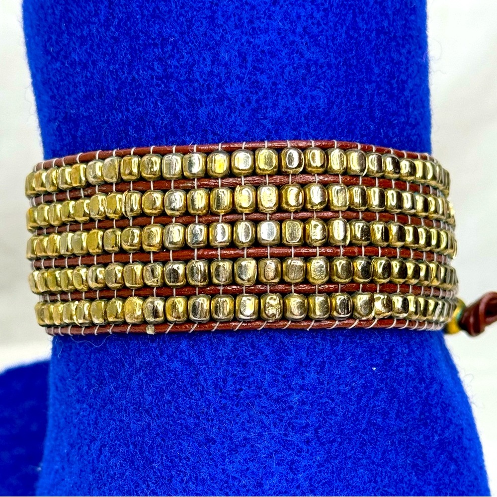 Brown leather bracelet Gold toned beaded bracelet with drawstring closure